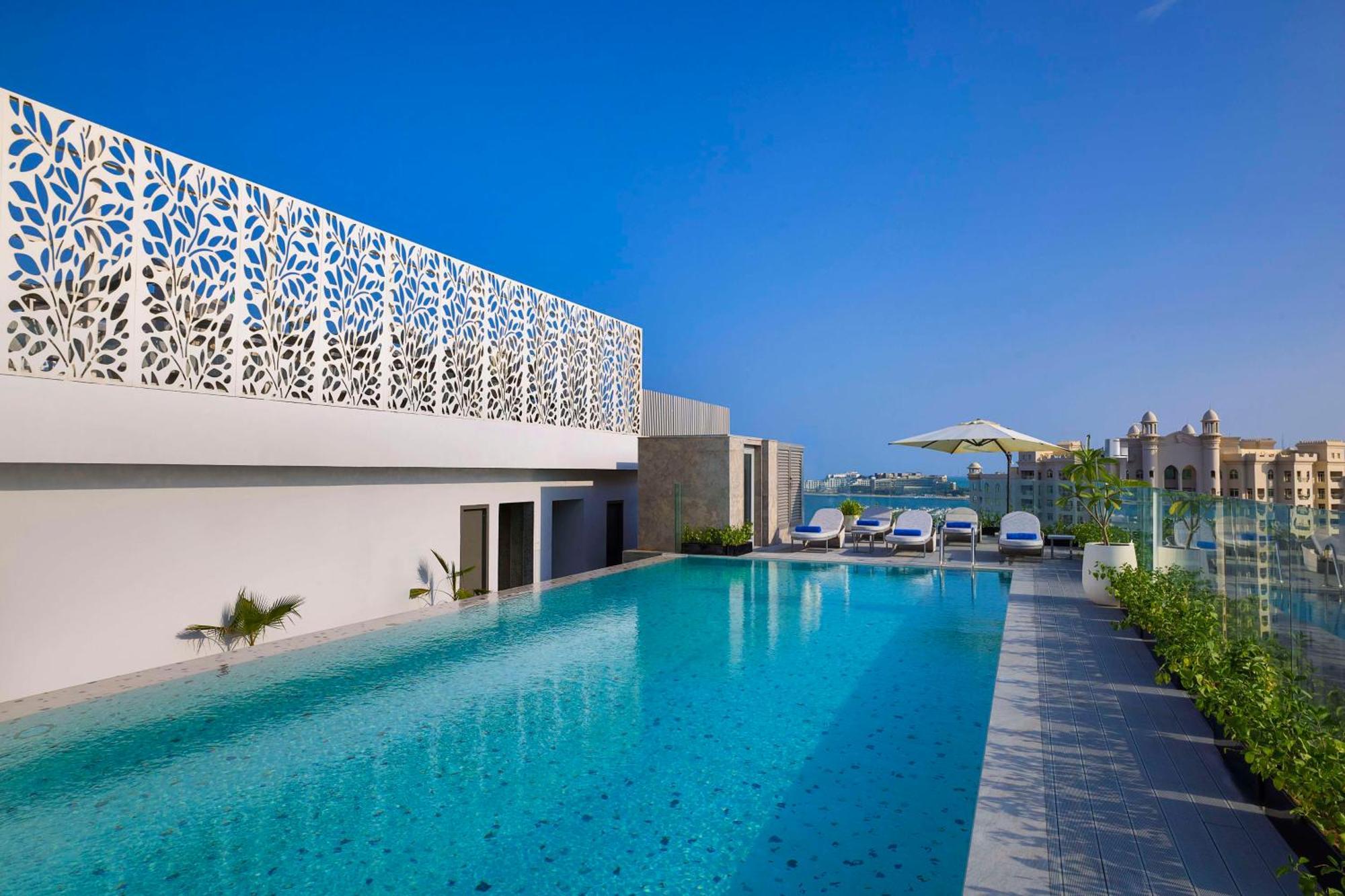 Tumbi West Palm Beach Hotel Dubai,Tapestry Collection Hilton Exteriér fotografie