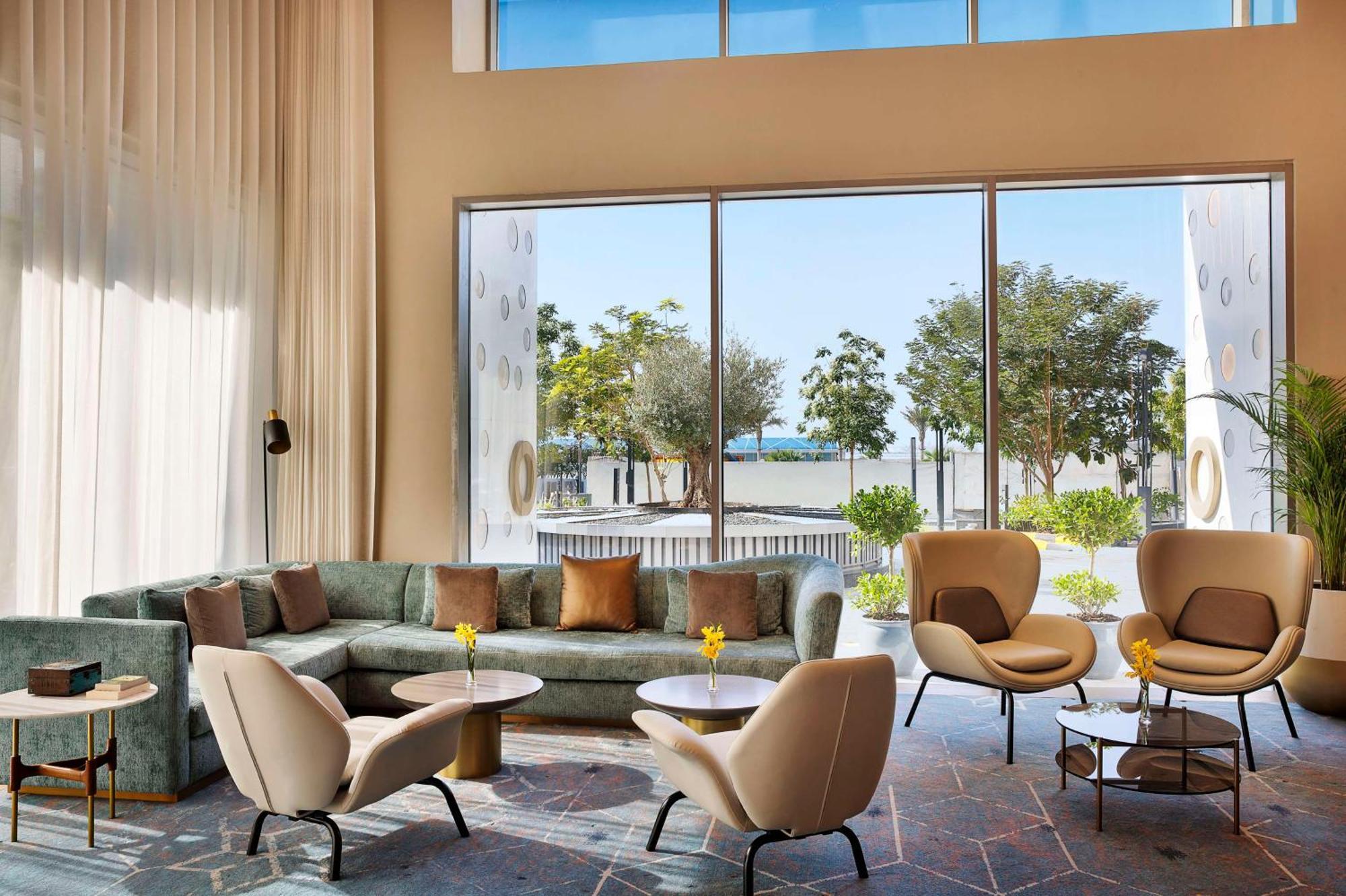 Tumbi West Palm Beach Hotel Dubai,Tapestry Collection Hilton Exteriér fotografie